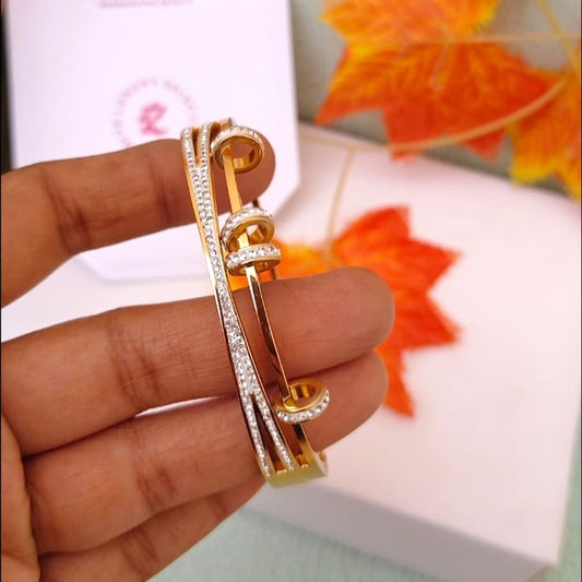 Close-up of an intricate stone work bracelet with shimmering hand-set gemstones.