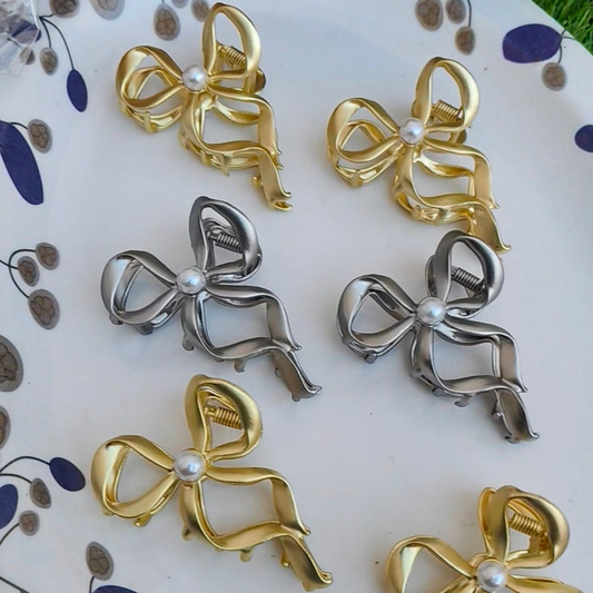 Bow Metal Clutches